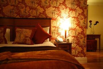 Фото номера Улучшенный двухместный номер с 2 отдельными кроватями Отель The Fairview Boutique Hotel г. Килларни 5