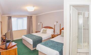 Фото номера Трехместный номер Гостевой дом Abbey Lodge г. Килларни 7