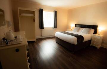 Фото номера Двухместный номер с 1 кроватью Гостевой дом McSorleys Accommodation and Bar г. Килларни 3