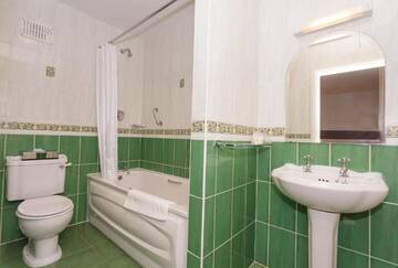 Фото номера Двухместный номер с 1 кроватью Гостевой дом Ashville House г. Килларни 10