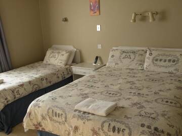 Фото номера Трехместный номер Гостевой дом Harmony Inn - Kingscourt г. Килларни 2
