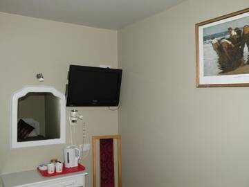 Фото номера Семейный номер (для 2 взрослых и 2 детей) Гостевой дом Harmony Inn - Kingscourt г. Килларни 5