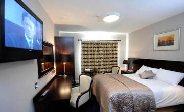 Фото номера Двухместный номер Делюкс с 1 кроватью Отель Killarney Court Hotel г. Килларни 5