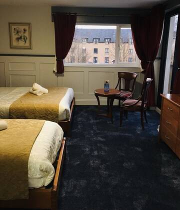 Фото номера Семейный суперлюкс Отели типа «постель и завтрак» Killarney Inn г. Килларни 5