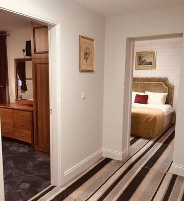 Фото номера Семейный суперлюкс Отели типа «постель и завтрак» Killarney Inn г. Килларни 6