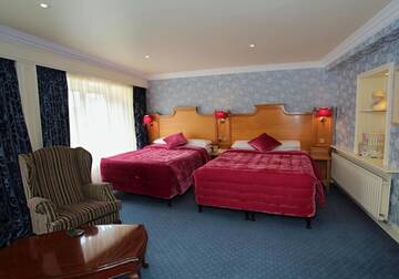 Фото номера Классический двухместный номер с 2 отдельными кроватями Отель Arbutus Hotel г. Килларни 6