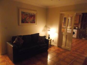 Фото номера Дом с 4 спальнями Дома для отпуска No 20 Killarney Holiday Village г. Килларни 9