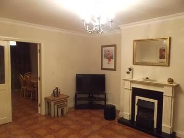 Фото номера Дом с 4 спальнями Дома для отпуска No 20 Killarney Holiday Village г. Килларни 4