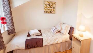 Фото номера Дом с 4 спальнями Дома для отпуска No 1 Killarney Holiday Village Vacation Home г. Килларни 73