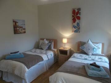 Фото номера Дом с 4 спальнями Дома для отпуска No 1 Killarney Holiday Village Vacation Home г. Килларни 60