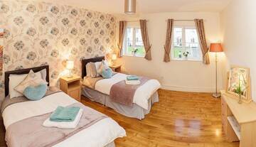Фото номера Дом с 4 спальнями Дома для отпуска No 1 Killarney Holiday Village Vacation Home г. Килларни 7