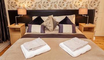 Фото номера Дом с 4 спальнями Дома для отпуска No 1 Killarney Holiday Village Vacation Home г. Килларни 68