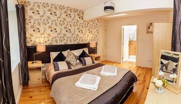 Фото номера Дом с 4 спальнями Дома для отпуска No 1 Killarney Holiday Village Vacation Home г. Килларни 70